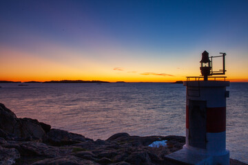 Fototapeta na wymiar sunrise over lighthouse 
