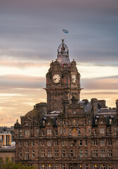 The Balmoral Hotel historical building in Edinburgh, Scotland, during a cloudy autumn morning....