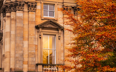 Edinburgh, Scotland - 2021: Street scenes from the historical city center of Edinburgh. Photos taken during an autumn cloudy morning. Landmark buildings in the United Kingdom. Architecture details.