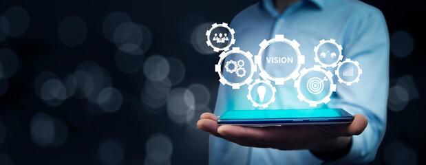 vision concept with man holding tablet © ARAMYAN