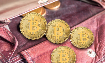 Old wallet with bitcoins symbol