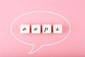 Speech bubble with single word oops on bright pink background