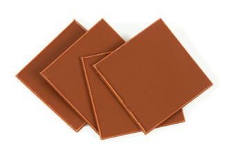 thin slices of chocolate isolated on white backrgound