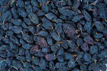 blue raisins isolated on white background