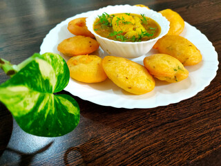 Jharkhand's famous snack Dhuska with potato curry