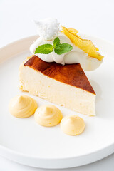 cheesecake with sauce and orange