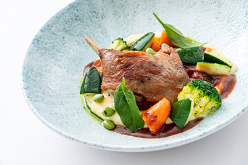 Goose Legs with vegetables isolated