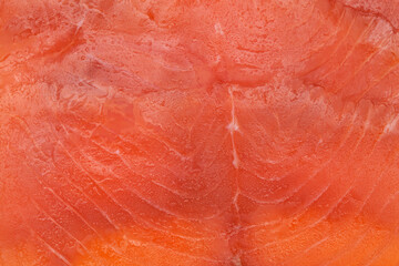 thin slices of Smoked salmon macro food background