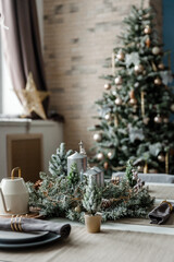 Modern design Christmas tree decorated with balls, toys and garlands. Christmas or New Year background. Winter holidays composition.