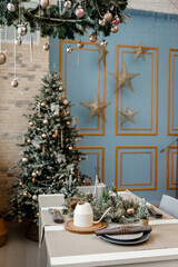 Modern design Christmas tree decorated with balls, toys and garlands. Christmas or New Year background. Winter holidays composition.