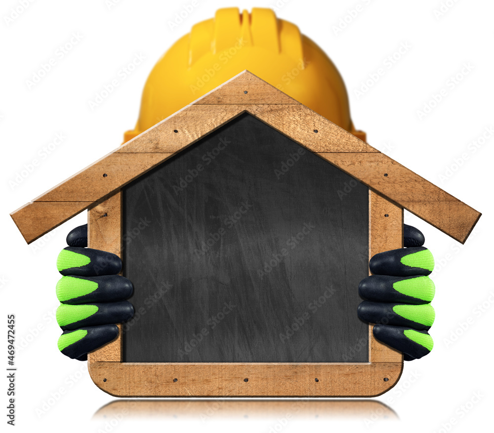 Poster manual worker with a safety helmet and work gloves holding a blank chalkboard in the shape of a wood
