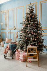 Modern design Christmas tree decorated with balls, toys and garlands. Christmas or New Year background. Winter holidays composition.