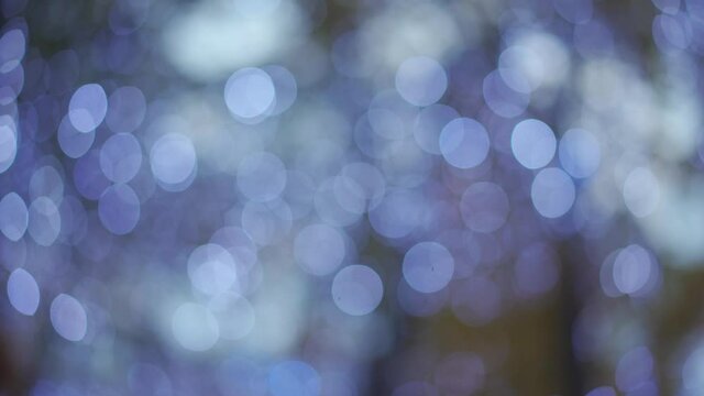 Abstract Soft light blurry bokeh. Golden light bokeh image for title text and video animation. Abstract bokeh golden particles