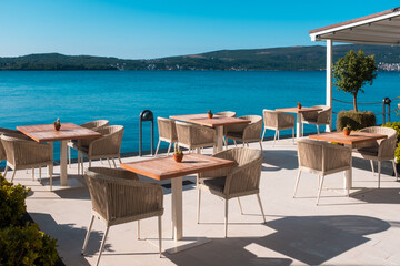 Empty chair and table with outdoor view. Tivat Porto Montenegro
