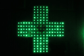 green cross in the dark