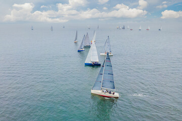 Obraz premium Aerial bird's eye view photo taken by drone of sailboat in turquoise sea water