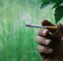 hand holding cigarette