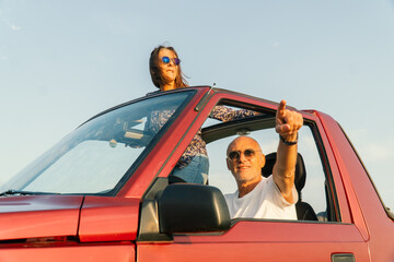 Aged couple enjoying their retirement holidays on the coast © Dario