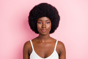 Photo of strict young brunette lady wear white top isolated on pastel pink color background