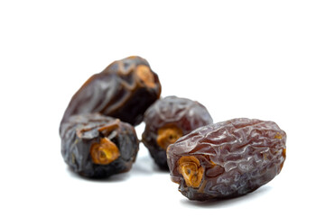 Date fruits on the white background. Fresh Medjool Dates for ramadan. Close up