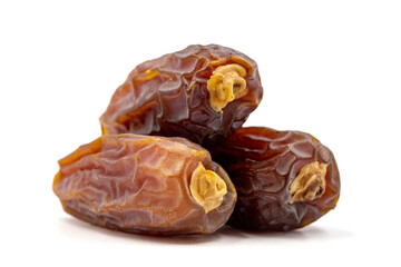Date fruits on the white background. Fresh Medjool Dates for ramadan. Close up
