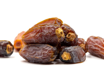 Date fruits on the white background. Fresh Medjool Dates for ramadan. Close up