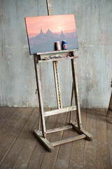 artwork landscape in studio of arts on easel
