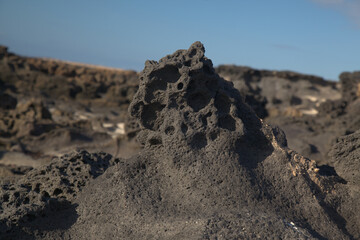 Porous lava volcanic rock around around Playa de la Concha beach in El Cotillo La Oliva...