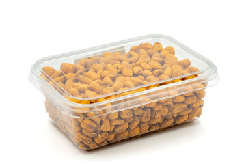 Packed snack toasted salted corn isolated on white background. Snack fresh nuts. close up
