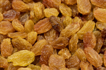 Close-up of dried raisins. food background. Snack fresh nuts. close-up nuts