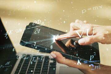 Double exposure of creative scientific formula concept with finger clicks on a digital tablet on...