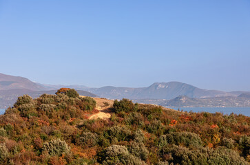 Picturesque autumn hill on the coast of Lake Garda