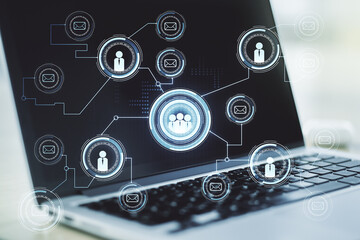 Social network concept with modern laptop on background. Multiexposure