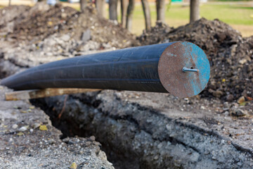 Modern plastic pipe, communications repair with selective focus. Replacement of water supply pipes....