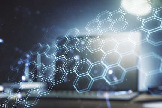 Double exposure of technology hologram with hexagon on laptop background. Research and development software concept