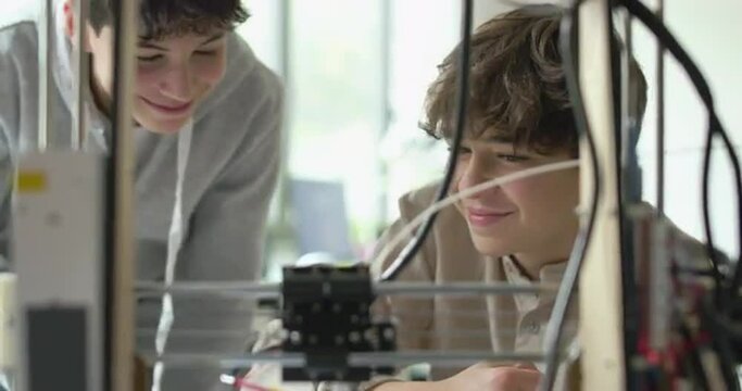 Students printing a prototype using a 3D printer