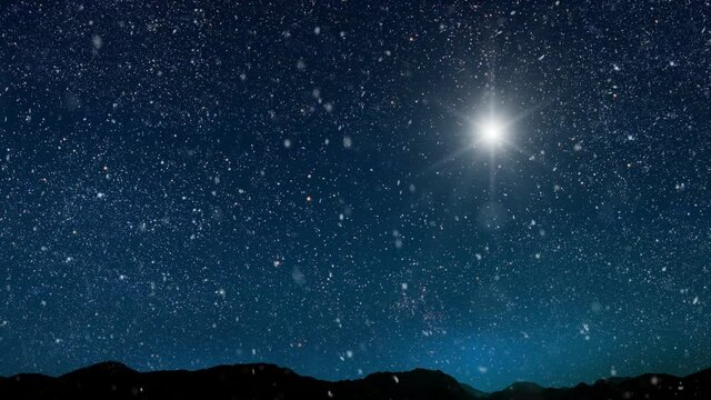 The star shines over the manger of christmas of Jesus Christ.