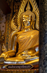 Fototapeta premium Phitsanulok, THAILAND - November 12, 2021: Somdet Nang Phaya Ruean Kaew is the name of the Buddha Statue in a chapel of Nang Phaya Temple, Phitsanulok province.
