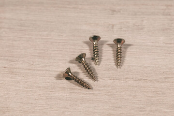 Four screws on the work table