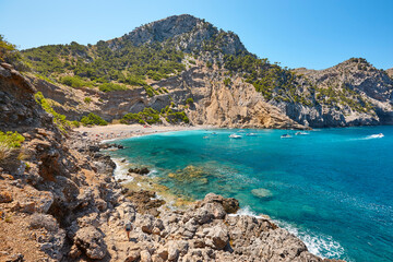 Turquoise waters in Mallorca. Coll Baix beach. Mediterranean coastline. Balearic