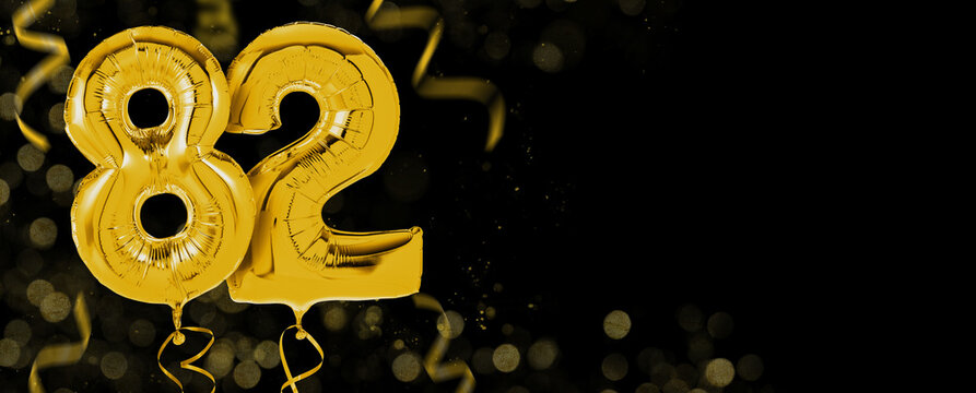 Golden balloons with copy space - Number 82