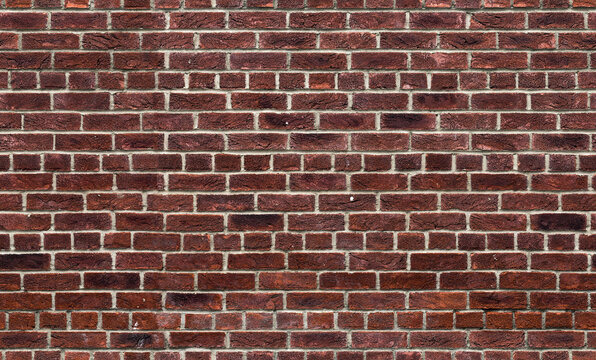 Fototapeta Red brick wall background with copy space. The file is a seamless texture, allowing the picture to be tiled, in order to create the effect of much bigger wall.