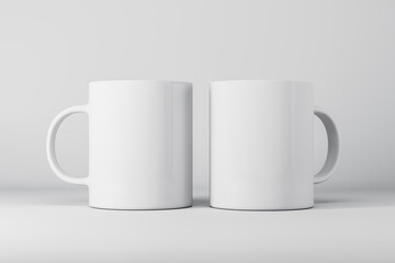 Two empty white mugs or cup on light background with mock up place for your advertisement. 3D Rendering.