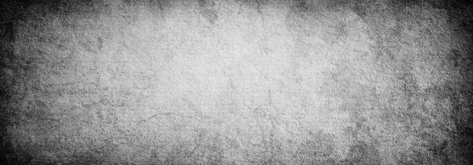 Grunge background made of old black and white paper with texture