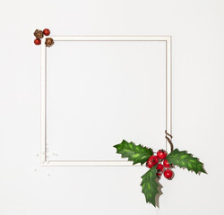 Christmas square frame with paper card space with winter red berries with green leaves and ornaments on white background. Minimal winter holidays and New Year layout.