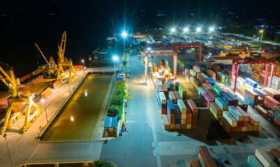 Container ship in export and import business and logistics. at Cambodia . Water transport International. Aerial view