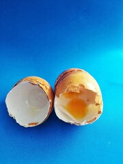 two egg shells that open after the inside is taken