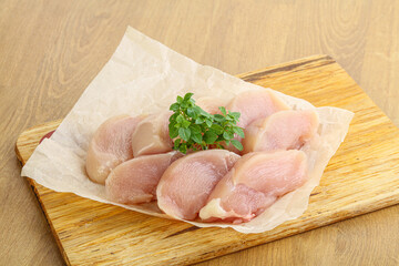 Raw chicken breast slices for cooking