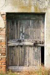 evocative image of old closed wooden door of a country house
