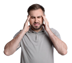 Young man suffering from headache on white background